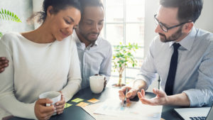 Couple Going over Financials with Employee